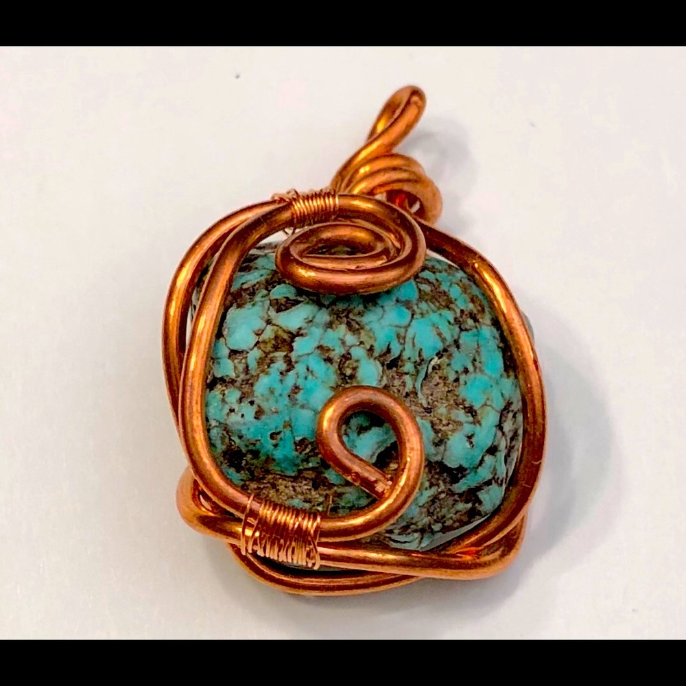Handmade Copper wire wrapped turquoise nugget pendant.